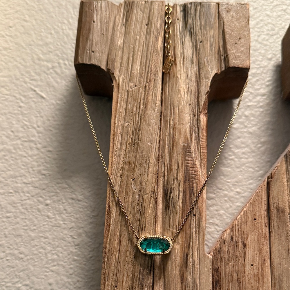 Elegant Kendra Scott Gold Necklace with emerald green pendant